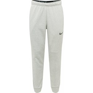 Sportovní kalhoty Nike světle šedá