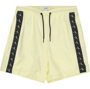 Plavecké šortky Calvin Klein Swimwear světle žlutá / černá